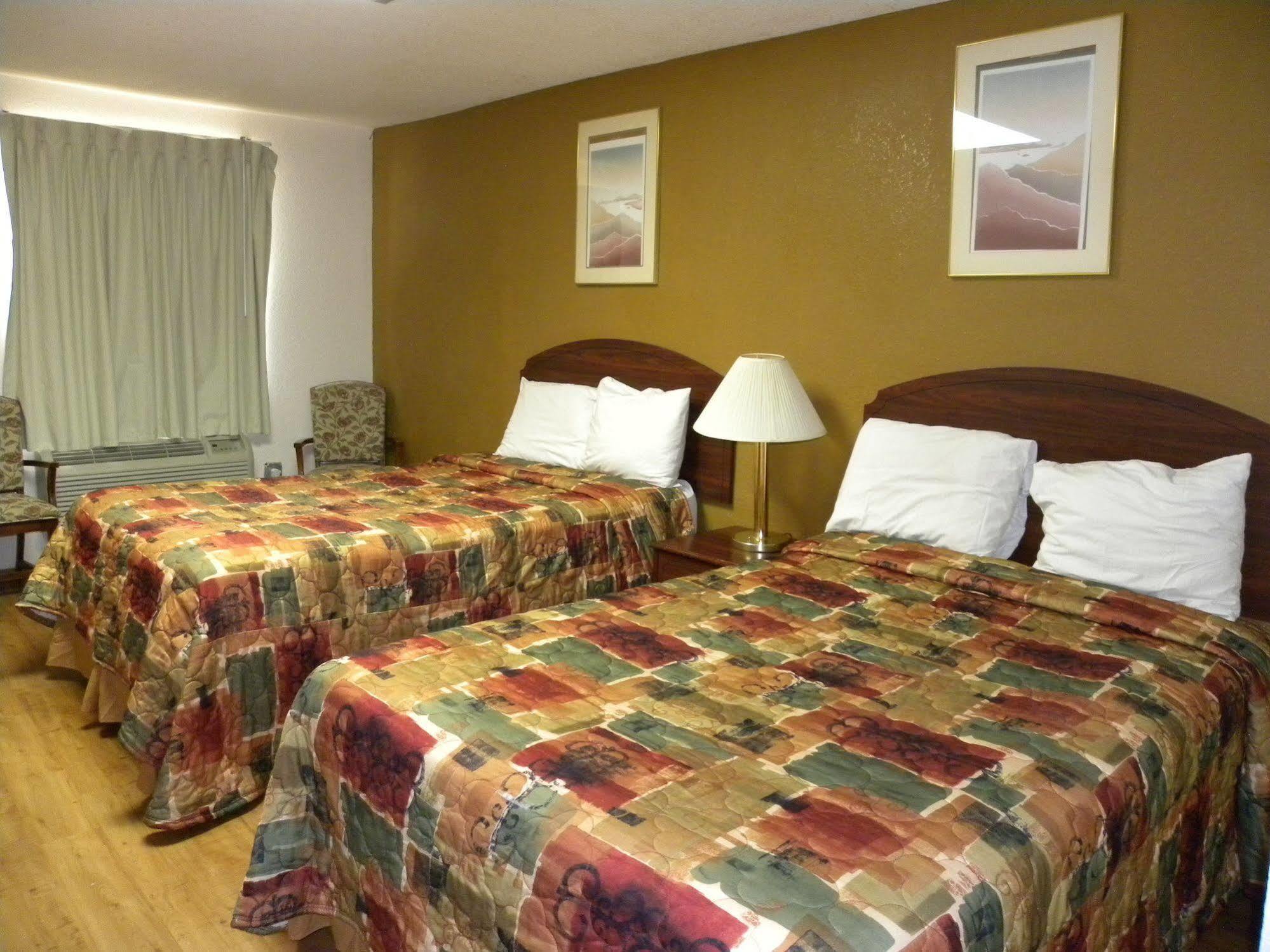 Guest Inn Роджърс Екстериор снимка