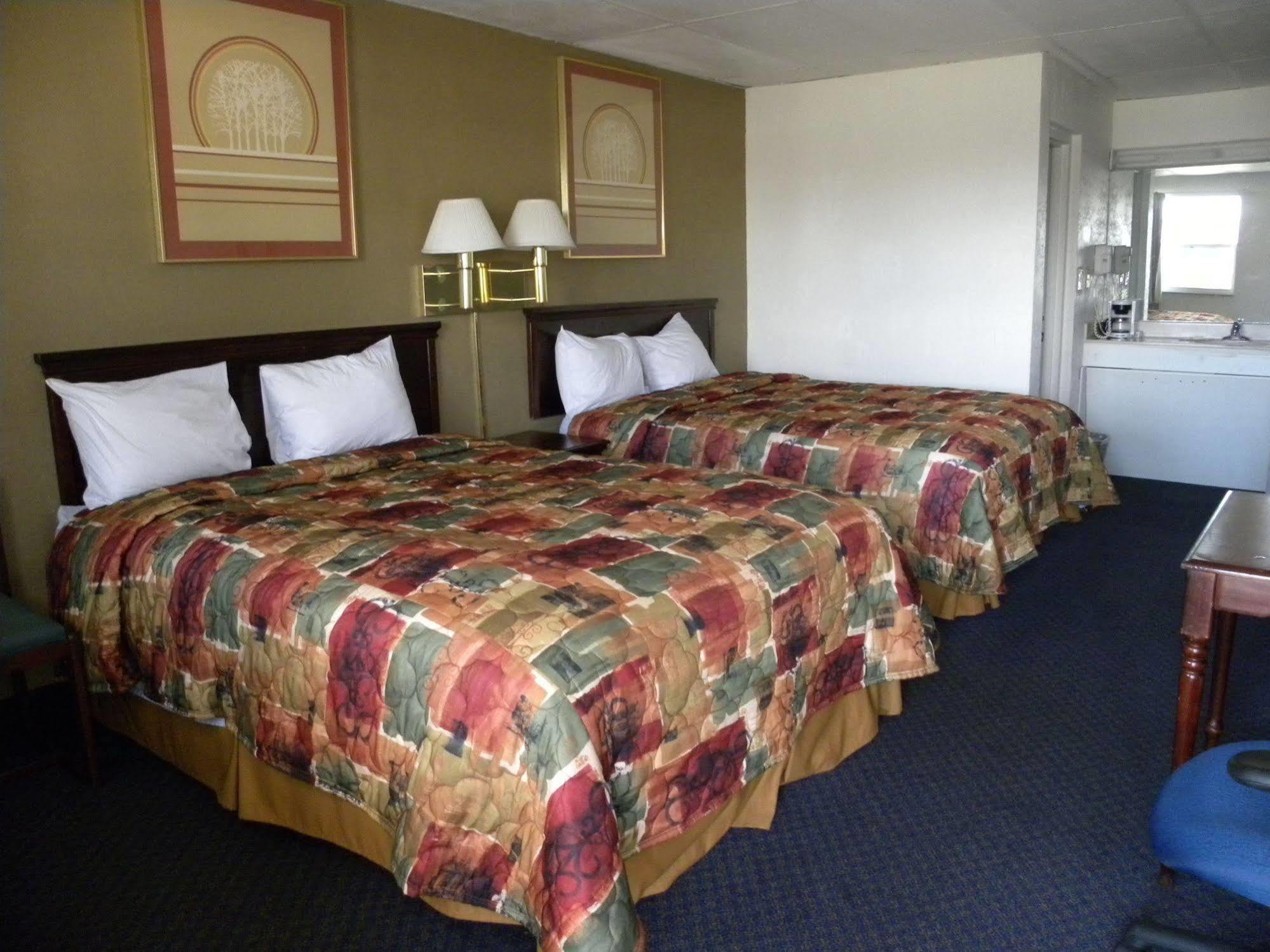Guest Inn Роджърс Екстериор снимка