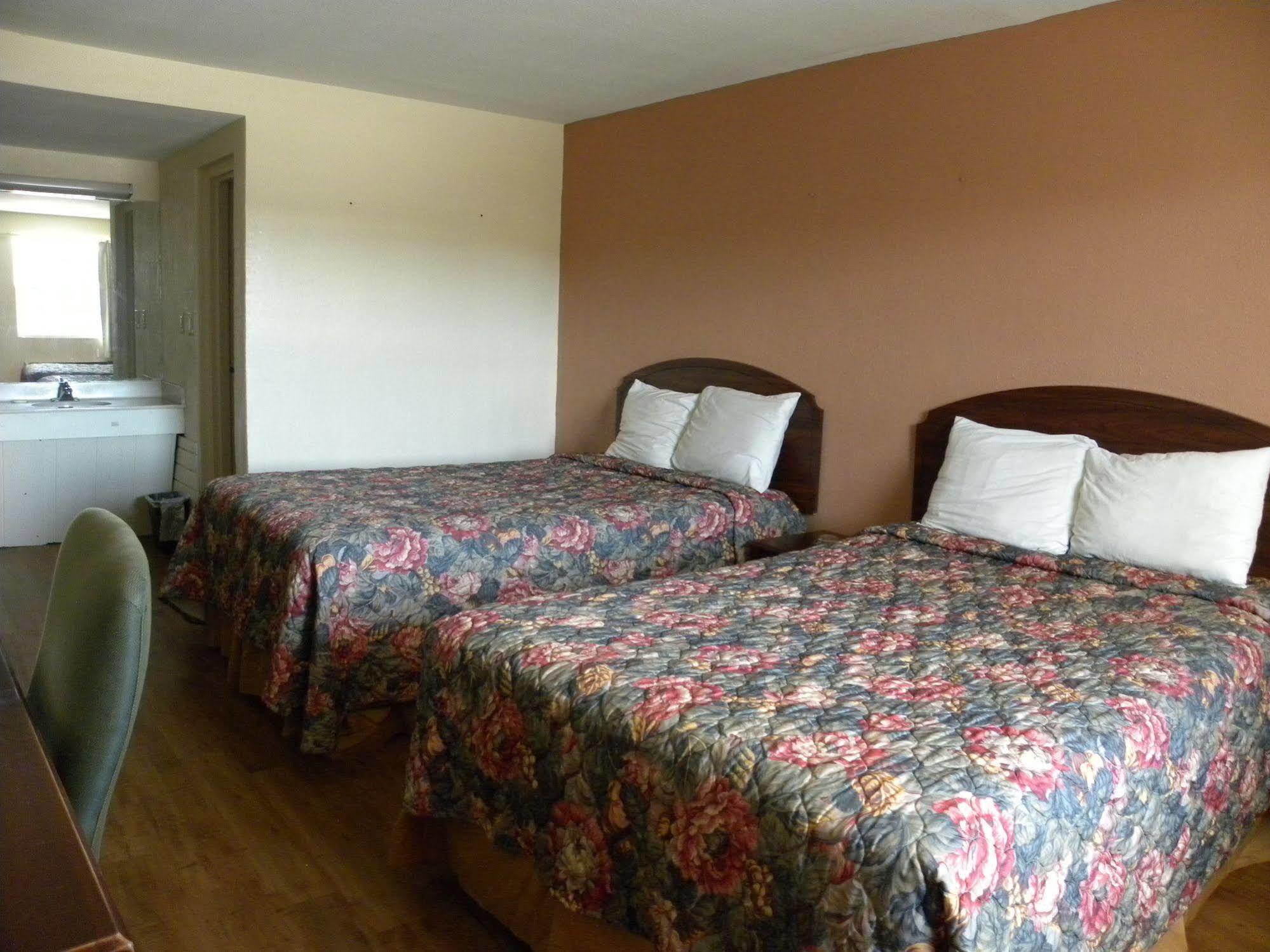 Guest Inn Роджърс Екстериор снимка