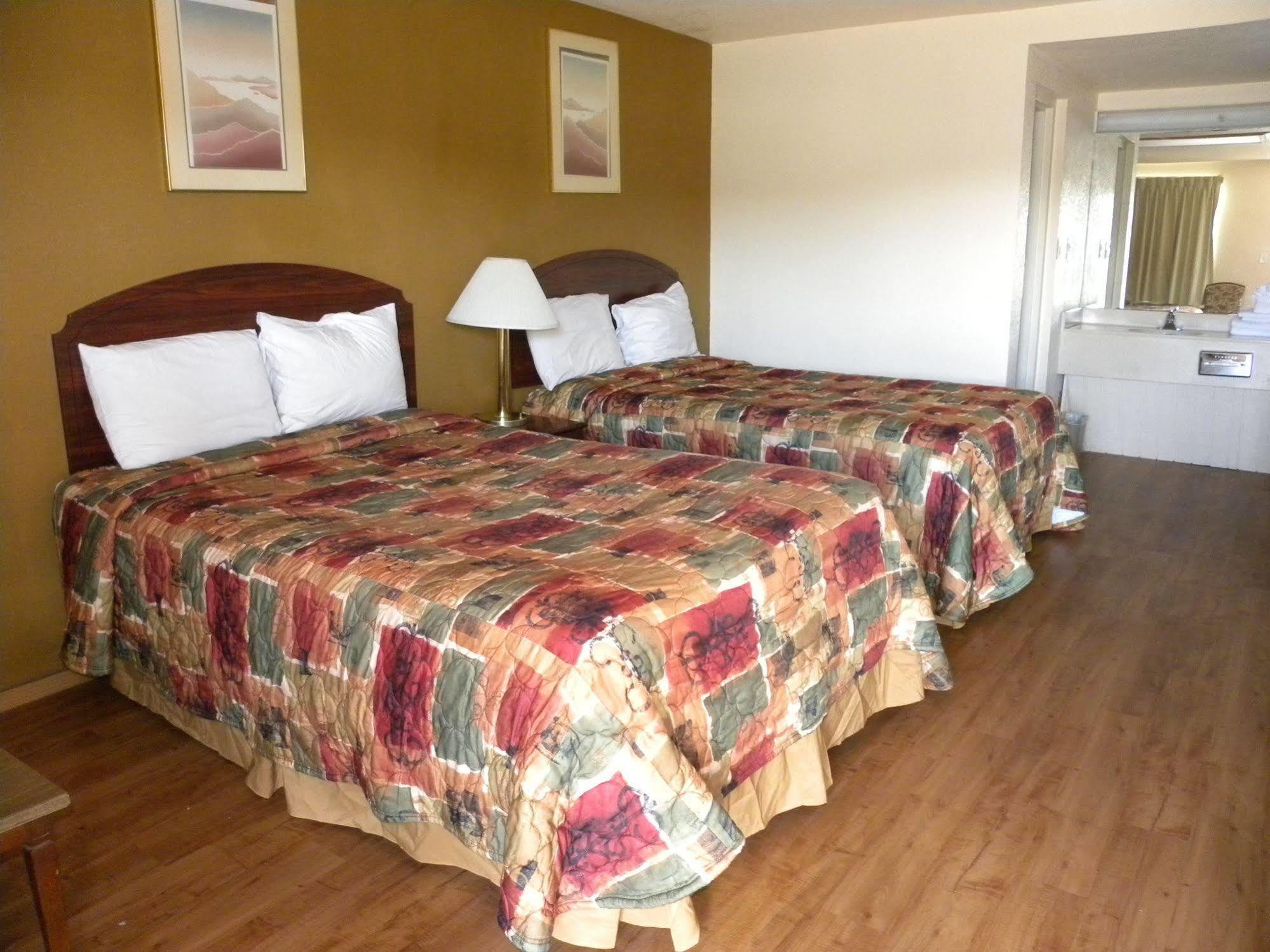 Guest Inn Роджърс Екстериор снимка