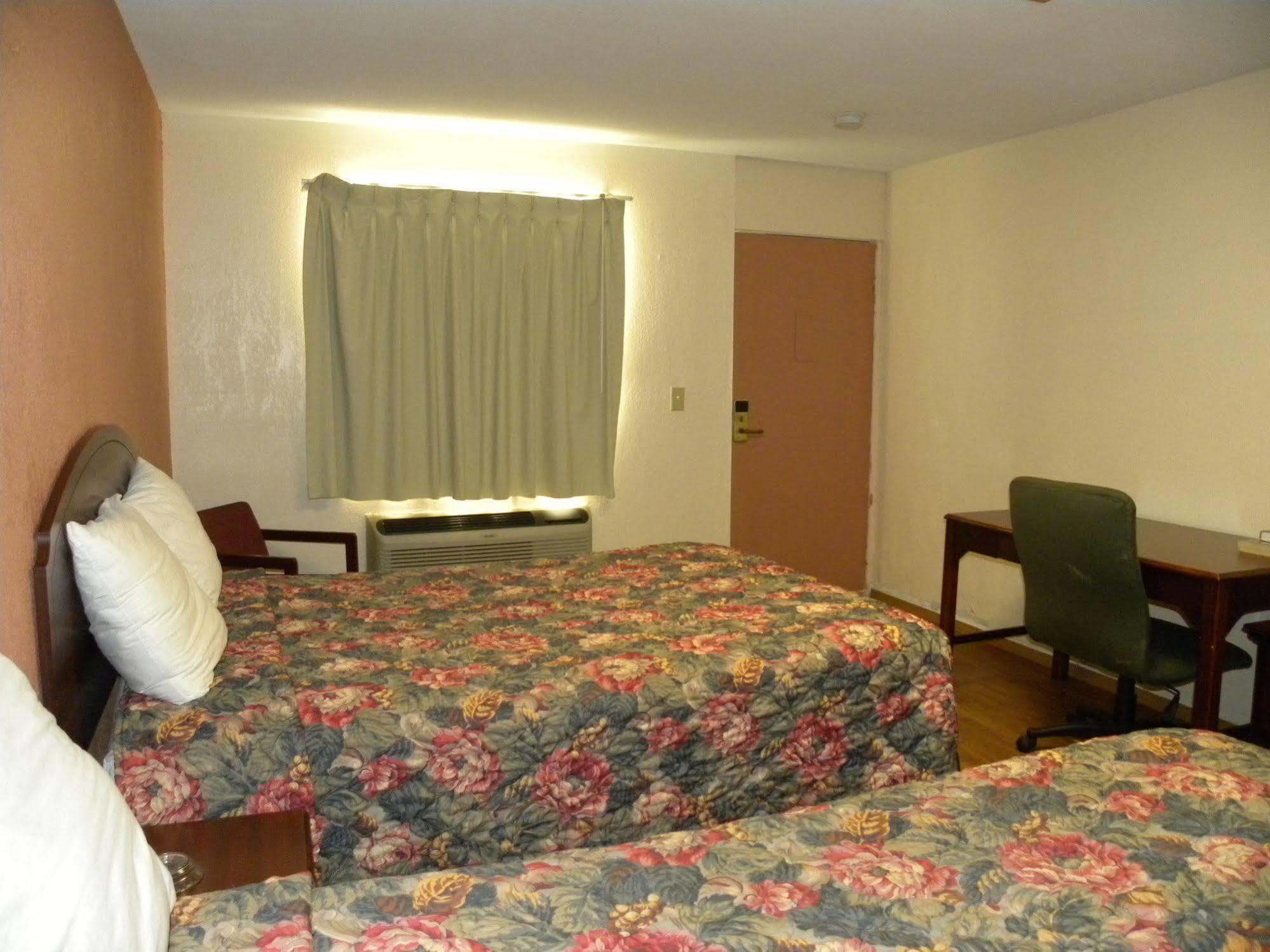 Guest Inn Роджърс Екстериор снимка